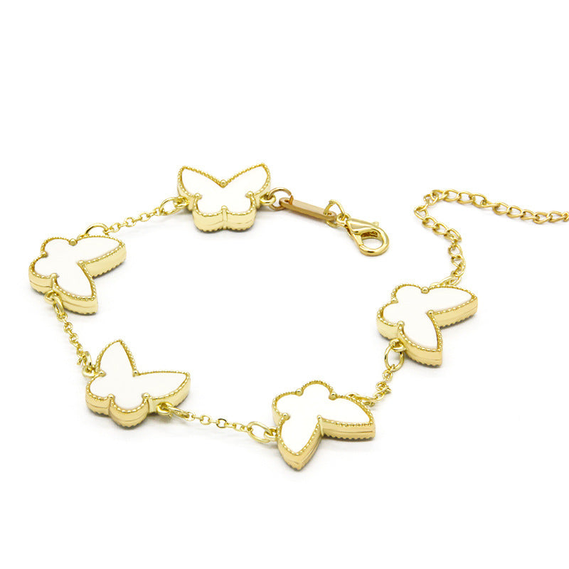 Armband mit fünf Schmetterlingen