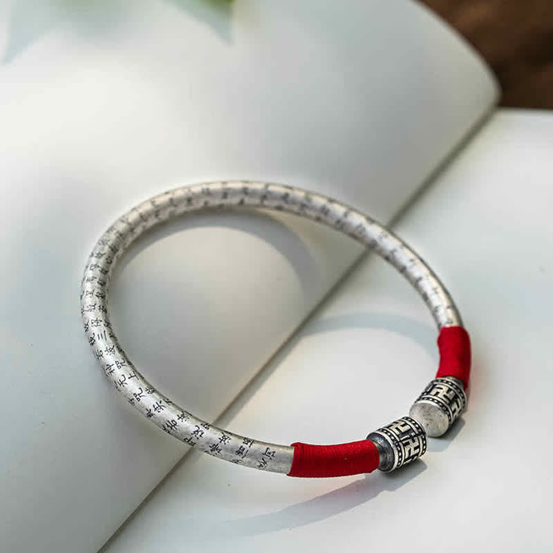 Carmiora Tibet Om Mani Padme Hum Glücksarmband mit roter Schnur