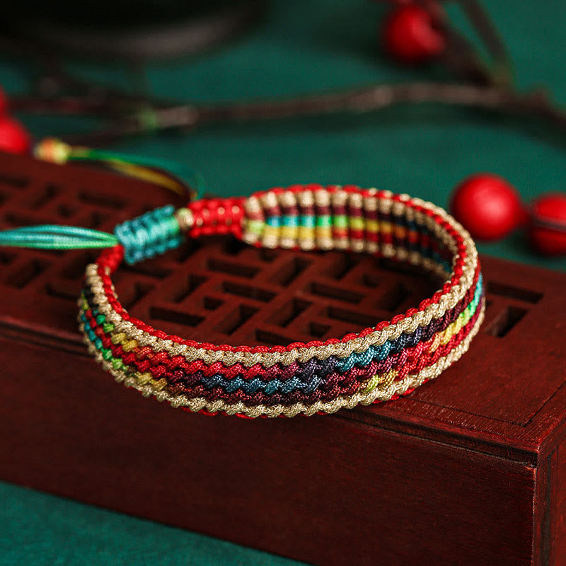 Carmiora Tibet Handgefertigtes, regenbogenfarbenes, geflochtenes Schutzarmband