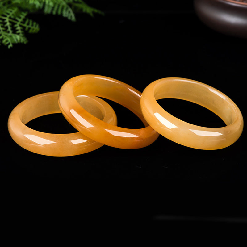 Carmiora Reichtumsarmband aus natürlicher goldener Seide und Jade
