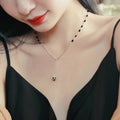 Schwarze Perlenkette im Gothic-Stil mit langem Kugelanhänger
