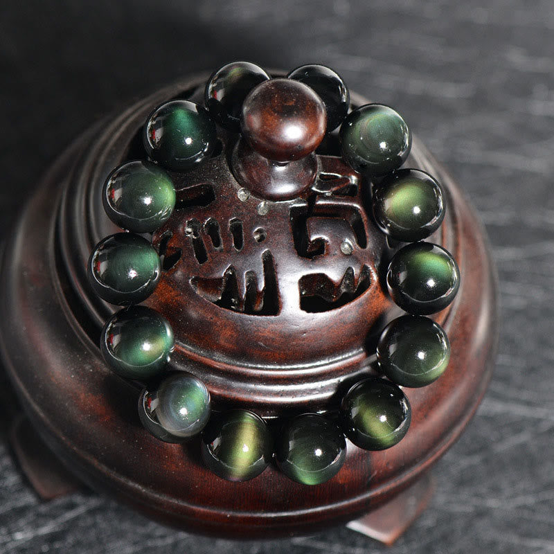 Carmiora Natürliches Obsidian-Armband mit grünem Auge