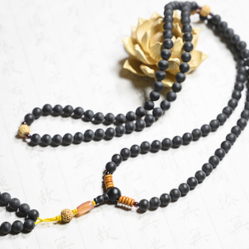Carmiora tibetisches Mala-Zypressen-Bodhi-Samen-Heilarmband aus rotem Achat
