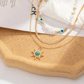 Mehrreihiges Goldketten-Set – Perlenhalsband, Böser Blick und Sonnenanhänger