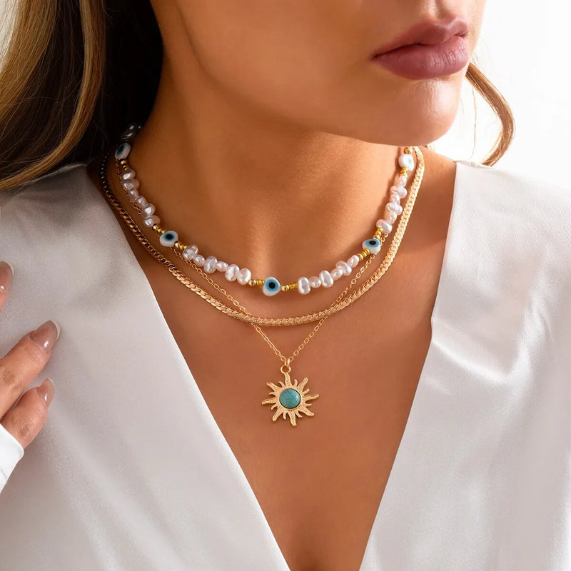 Mehrreihiges Goldketten-Set – Perlenhalsband, Böser Blick und Sonnenanhänger
