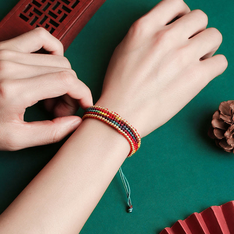 Carmiora Tibet Handgefertigtes, regenbogenfarbenes, geflochtenes Schutzarmband