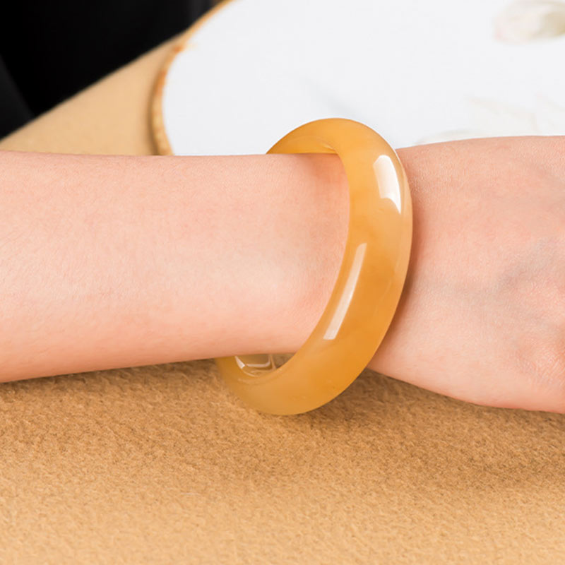 Carmiora Reichtumsarmband aus natürlicher goldener Seide und Jade