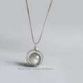 Carmiora 925 Sterling Silber Mondstein Love Planet Drehbarer Muster-Halskettenanhänger