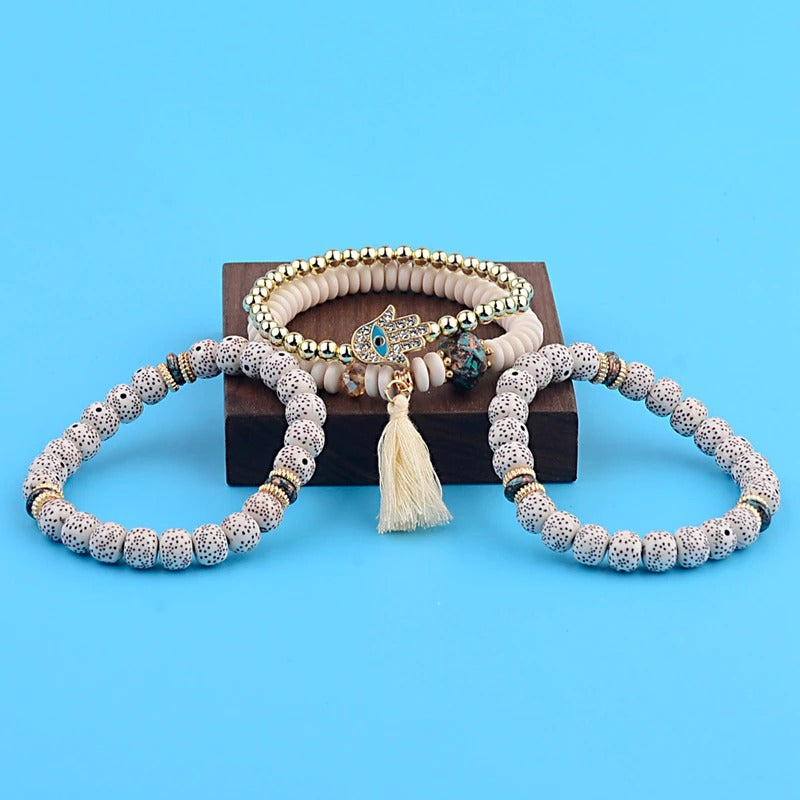 4-teiliges Set mit böhmischen Charm-Armbändern mit Quastenperlen