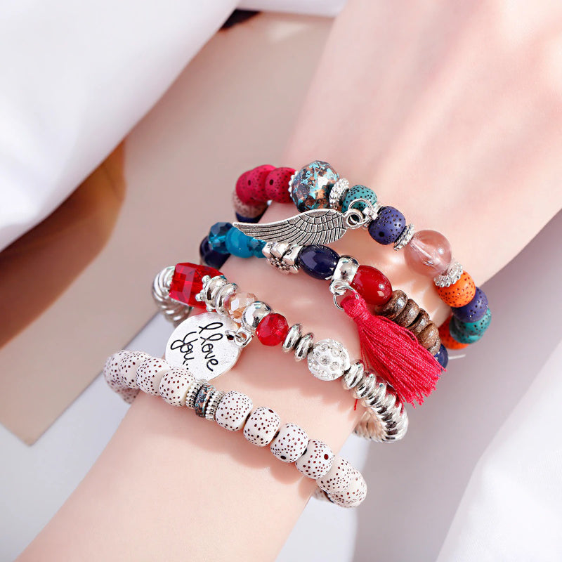 4-teiliges Set mit böhmischen Charm-Armbändern mit Quastenperlen