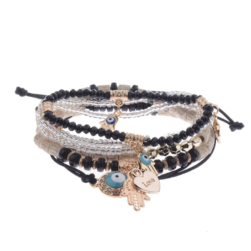 4-teiliges Set mit böhmischen Charm-Armbändern mit Quastenperlen