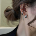4-teiliges Set mit geometrischen Ohrclips und Quastenkette