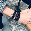 4-teiliges Set mit geflochtenen Wickelarmbändern aus veganem Leder im Vintage-Stil mit Holzperlen