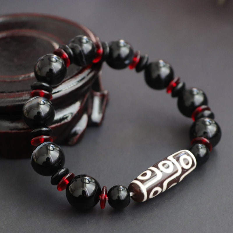 Carmiora Black Onyx Nine-Eye Dzi Bead Wealth Protection Armband