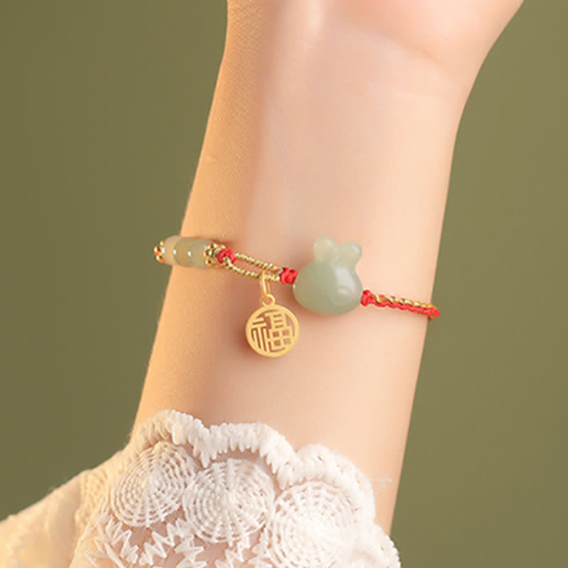 Carmiora 925 Sterling Silber Jahr des Kaninchens Hetian Jade Glück Glück rote Schnur Armband