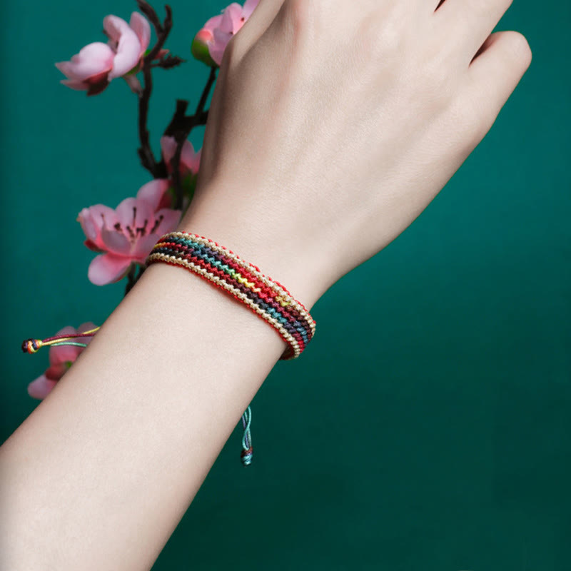 Carmiora Tibet Handgefertigtes, regenbogenfarbenes, geflochtenes Schutzarmband