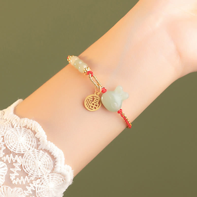 Carmiora 925 Sterling Silber Jahr des Kaninchens Hetian Jade Glück Glück rote Schnur Armband