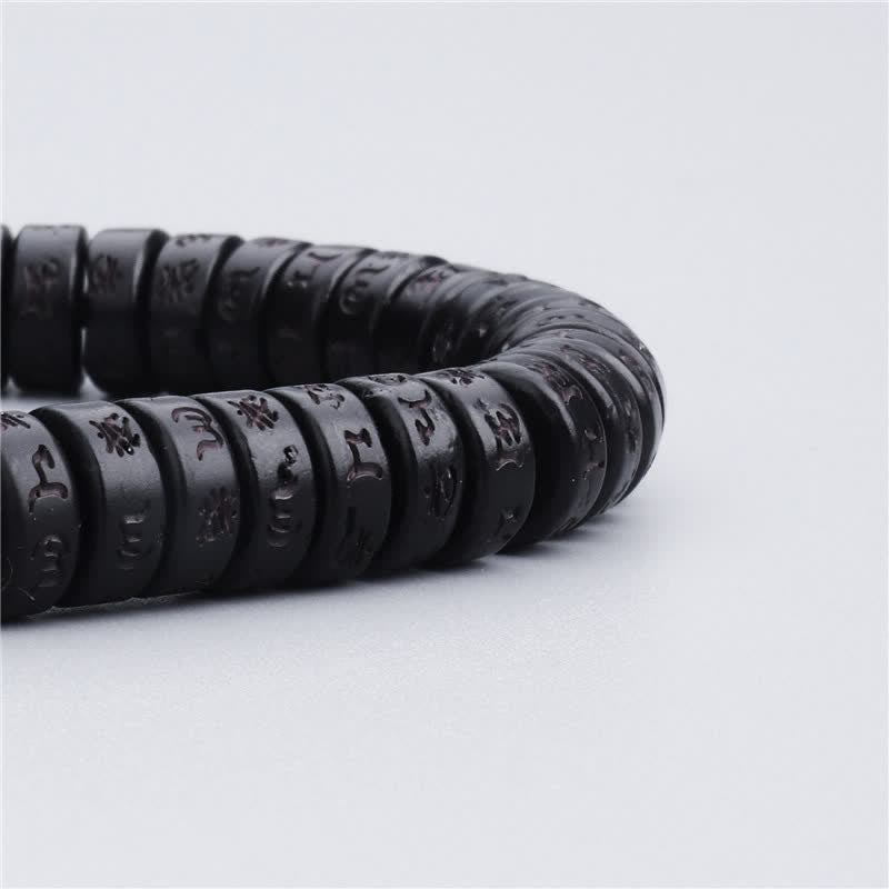 Carmiora tibetische Kokosnussschalen-Perlen mit Gravur Om Mani Padme Hum Mantra Glücksarmband