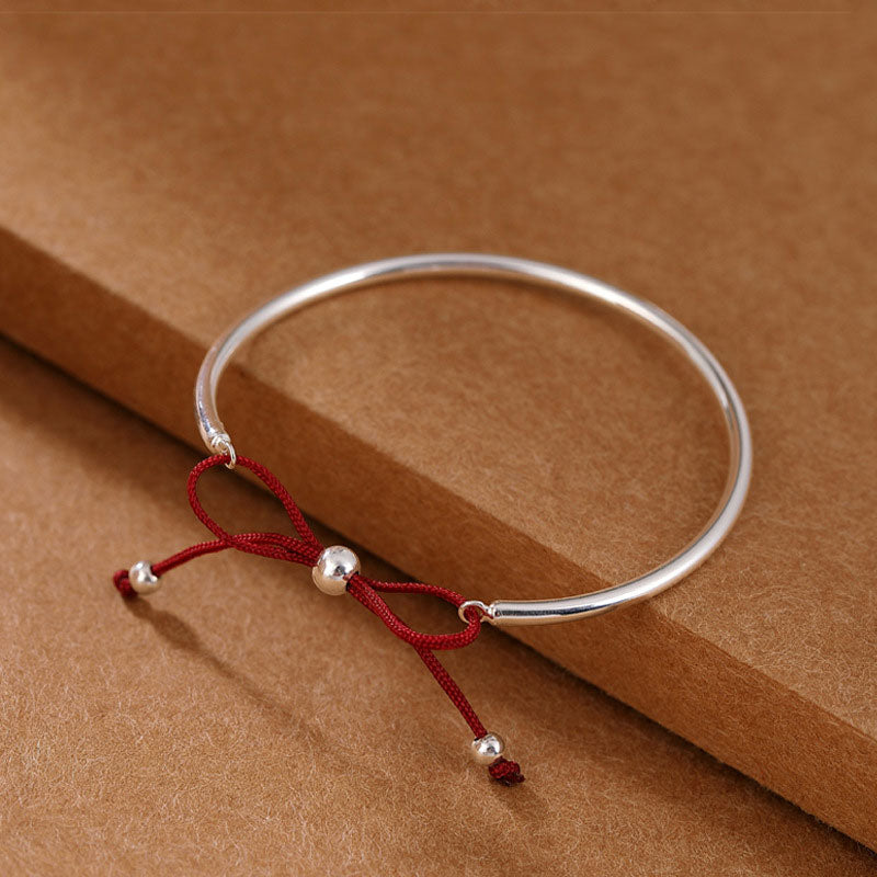 Carmiora-Armband aus 925er-Sterlingsilber mit roter Schnur und heilendem Knoten