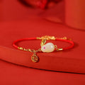 Carmiora 925 Sterling Silber Jahr des Kaninchens Hetian White Jade Luck Blessing Red String Armband