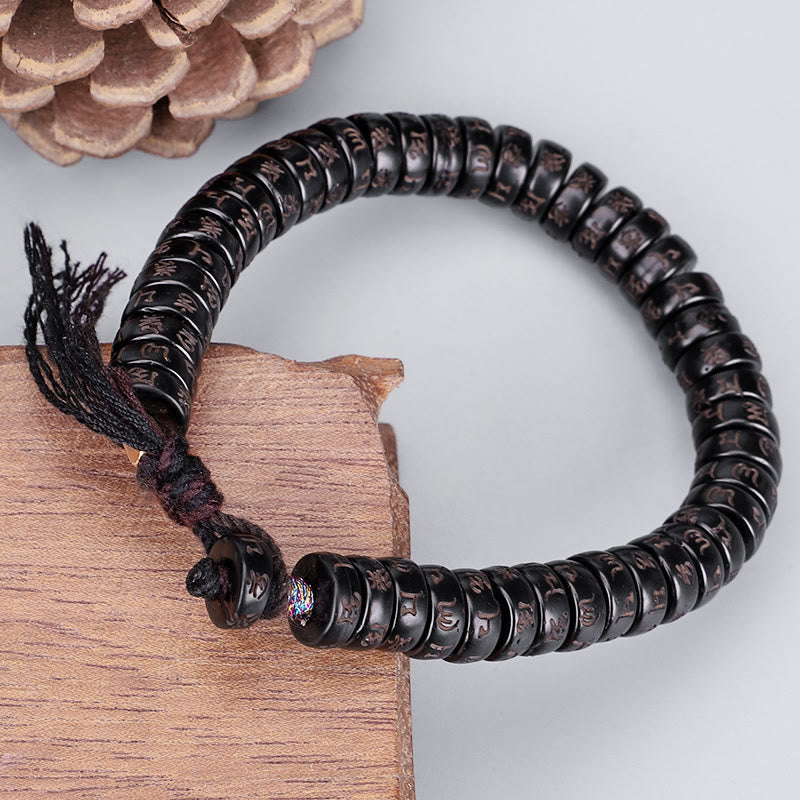 Carmiora tibetische Kokosnussschalen-Perlen mit Gravur Om Mani Padme Hum Mantra Positive String-Armband