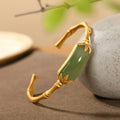 Carmiora Glücksarmband aus 925er Sterlingsilber mit weißer Jade, verstellbarer Armreif