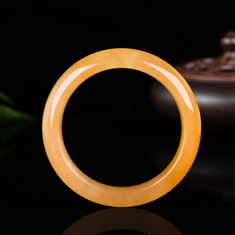 Carmiora Reichtumsarmband aus natürlicher goldener Seide und Jade