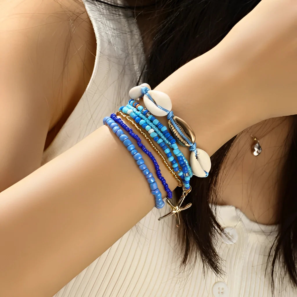 Stapelarmband mit Strandmotiv im Boho-Stil – Muschel- und Seestern-Anhänger in Gold