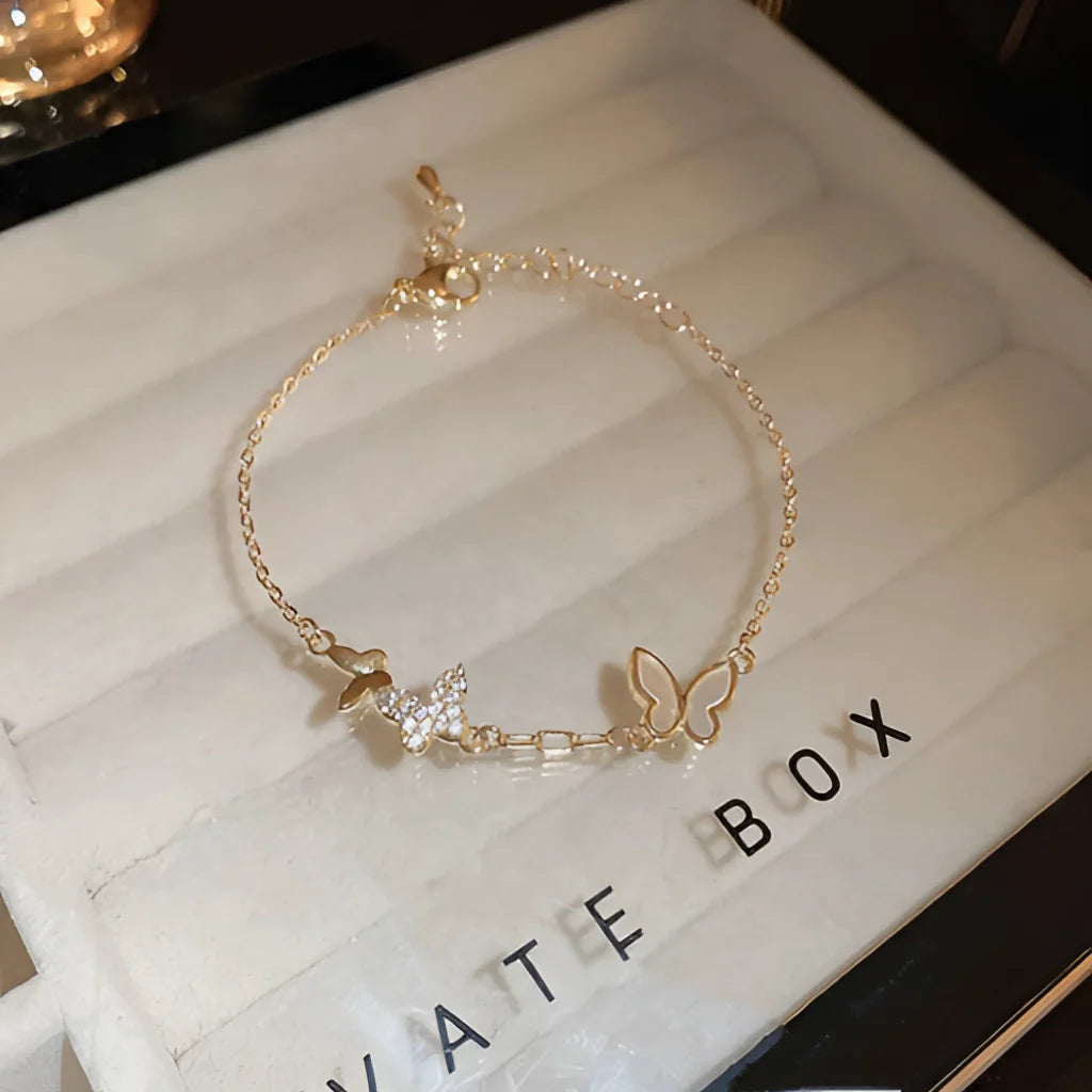 Schmetterling & Stern Gold Charm Armband - Elegantes verstellbares Schmuckgeschenk