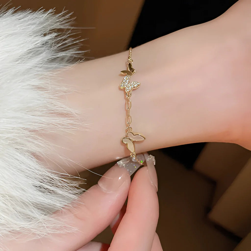 Schmetterling & Stern Gold Charm Armband - Elegantes verstellbares Schmuckgeschenk