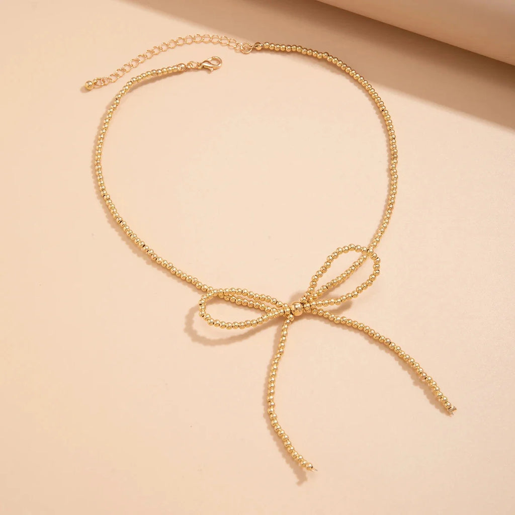 Elegantes Perlenschleifenarmband/Halskette - verstellbar, luxuriöse Abendgarderobe