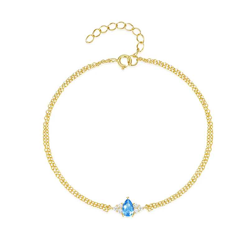 Luxuriöses Damen-Goldkettenarmband mit blauem Topas – verstellbarer Verschluss