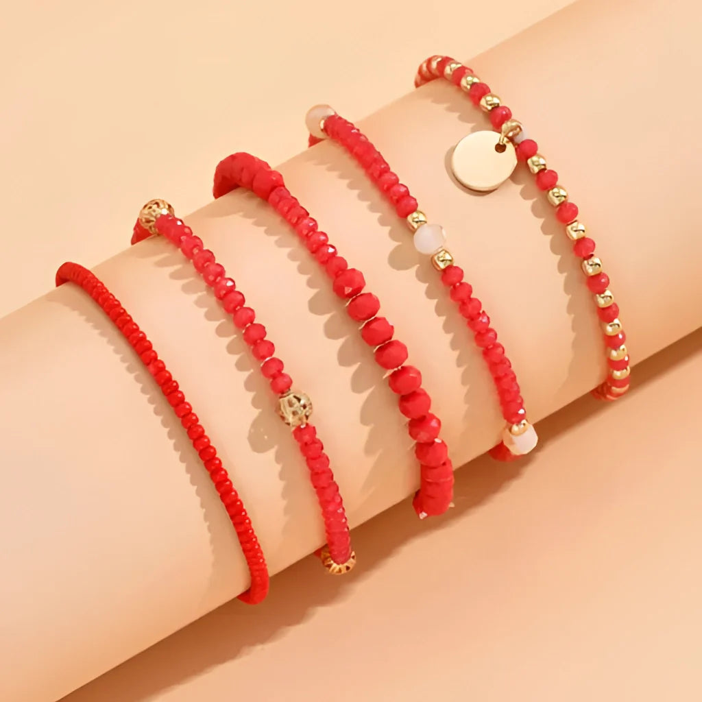 Jade-Perlenarmband mit goldenen Akzenten