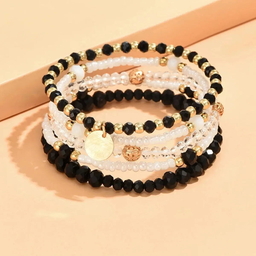 Jade-Perlenarmband mit goldenen Akzenten