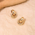Goldene Spiralohrringe - Moderner, luxuriöser, mehrschaliger Designerschmuck