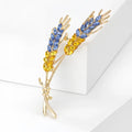 Luxuriöse Weizenbrosche mit blauem/gelbem Saphir – goldene Edelstein-Anstecknadel