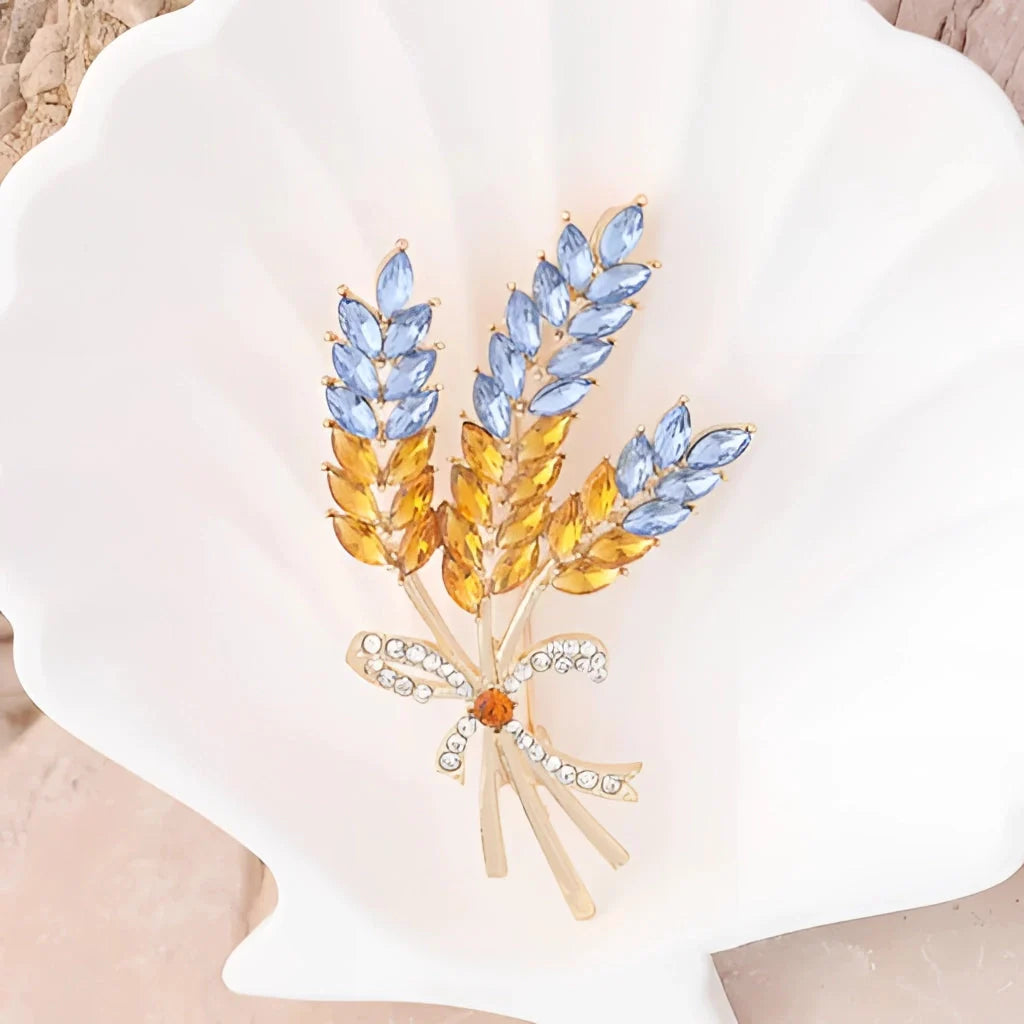 Luxuriöse Weizenbrosche mit blauem/gelbem Saphir – goldene Edelstein-Anstecknadel