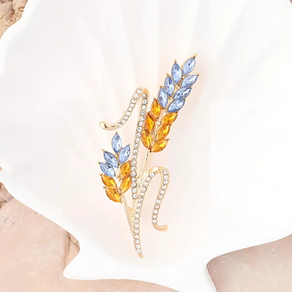 Luxuriöse Weizenbrosche mit blauem/gelbem Saphir – goldene Edelstein-Anstecknadel