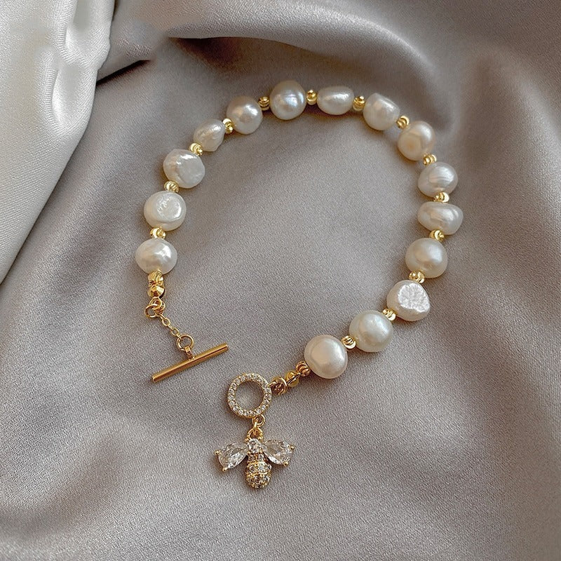 Modische Armbänder mit Bienenverzierung aus Naturperlen und Strass
