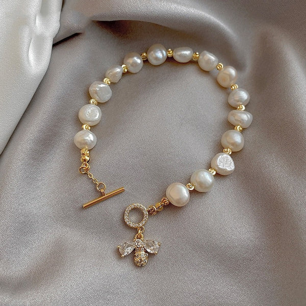 Modische Armbänder mit Bienenverzierung aus Naturperlen und Strass