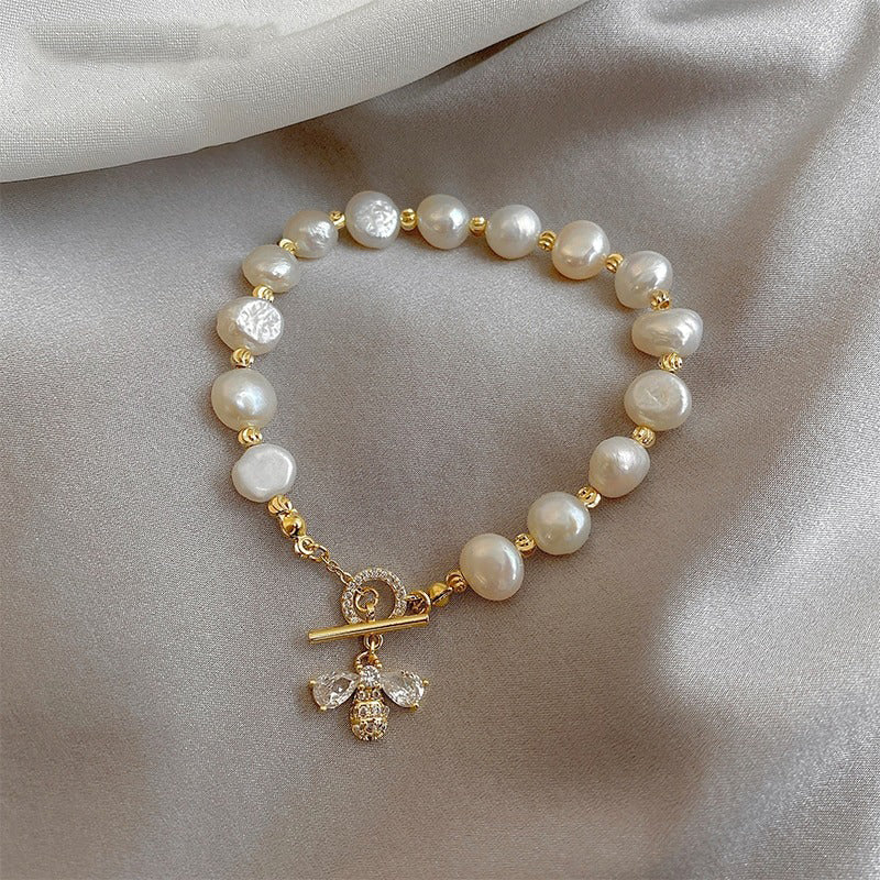 Modische Armbänder mit Bienenverzierung aus Naturperlen und Strass
