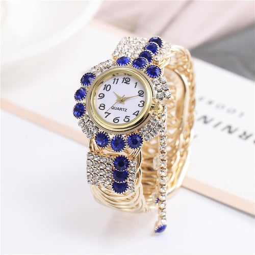 Armbanduhr mit Schmucksteinen und Strasssteinen