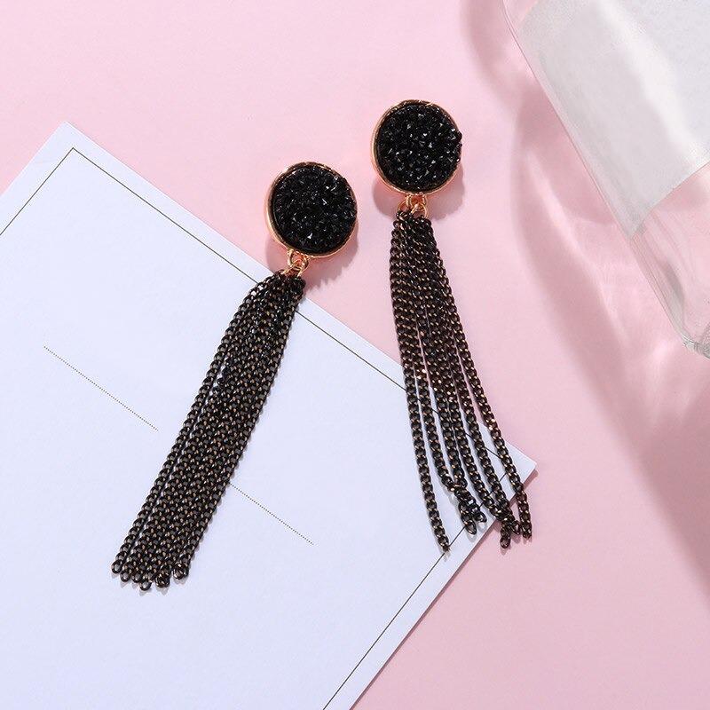 Geometrische Ohrringe in Schwarz und Gold