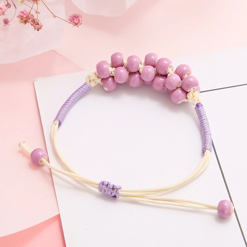 Bunte handgefertigte Perlenarmbänder mit Blumenblatt-Charm