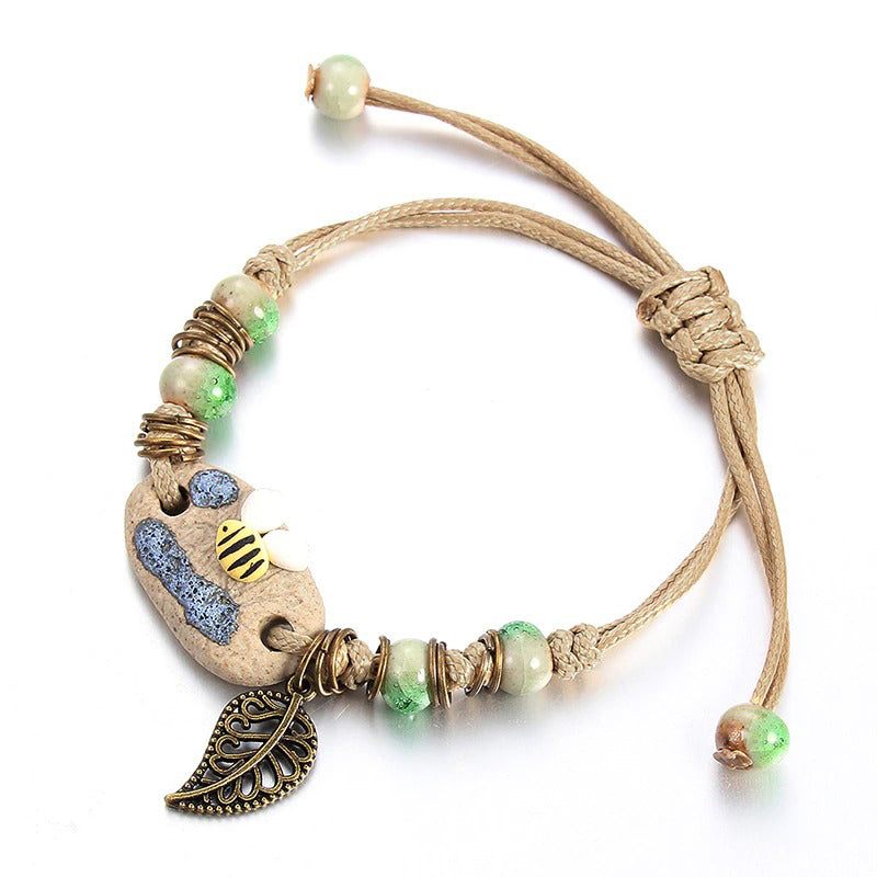 Bunte handgefertigte Perlenarmbänder mit Blumenblatt-Charm