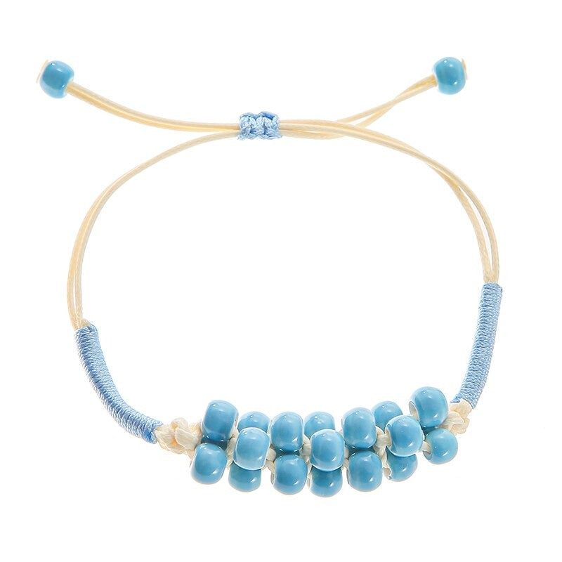 Bunte handgefertigte Perlenarmbänder mit Blumenblatt-Charm