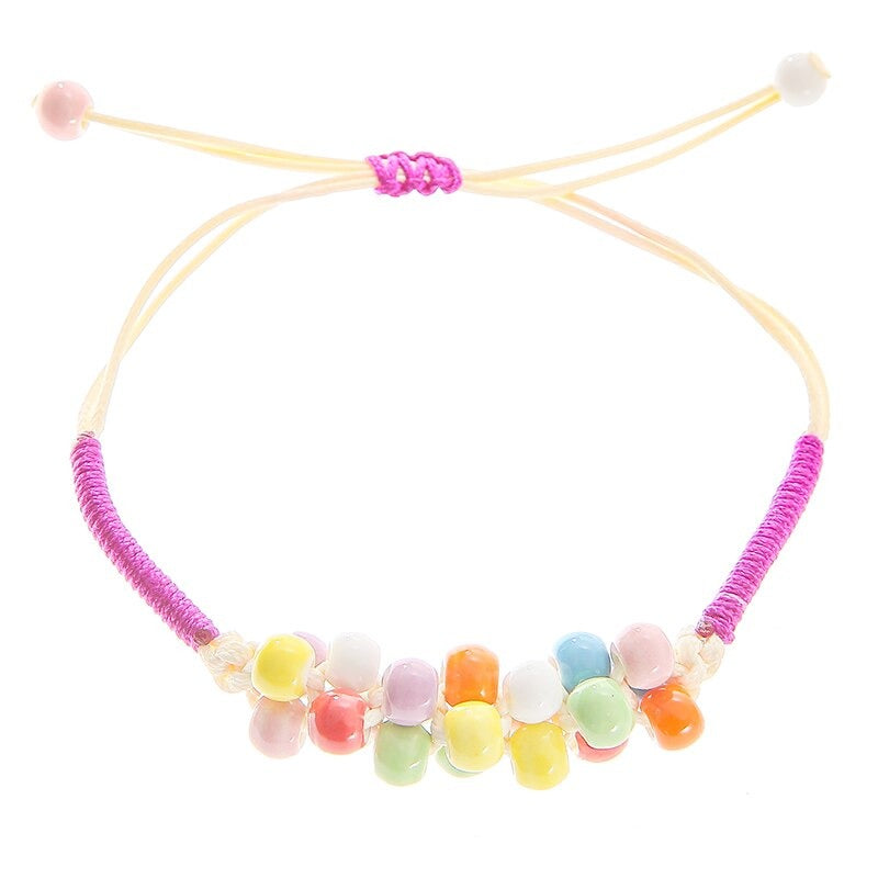 Bunte handgefertigte Perlenarmbänder mit Blumenblatt-Charm