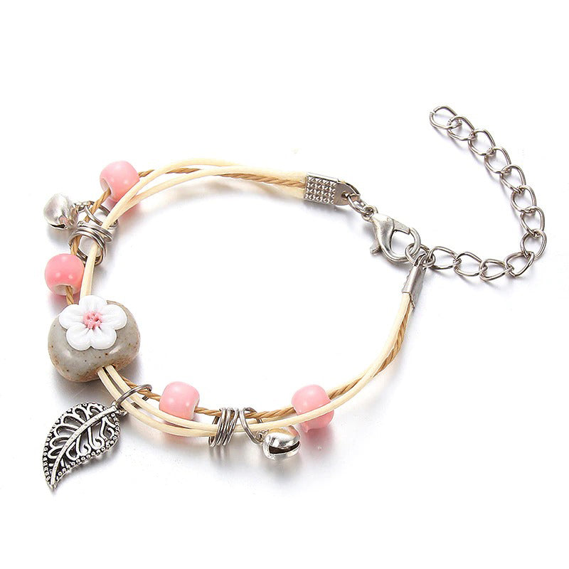Bunte handgefertigte Perlenarmbänder mit Blumenblatt-Charm