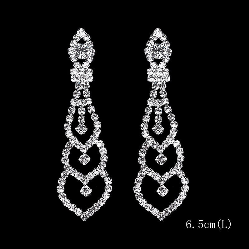 Kollektion brillanter, mit Strasssteinen verzierter, langer Tropfenohrringe mit Quaste