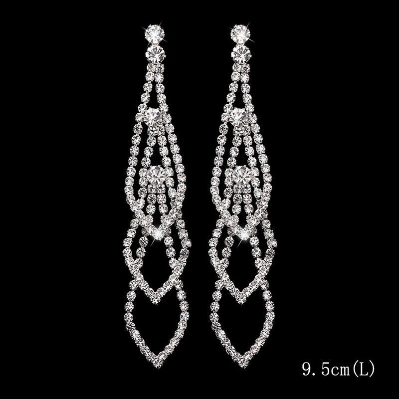 Kollektion brillanter, mit Strasssteinen verzierter, langer Tropfenohrringe mit Quaste